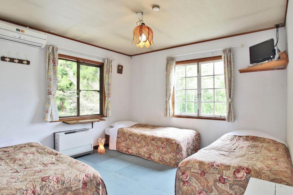 Bed and Breakfast ペンション ちゃうちゃう Hakuba Pokoj fotografie